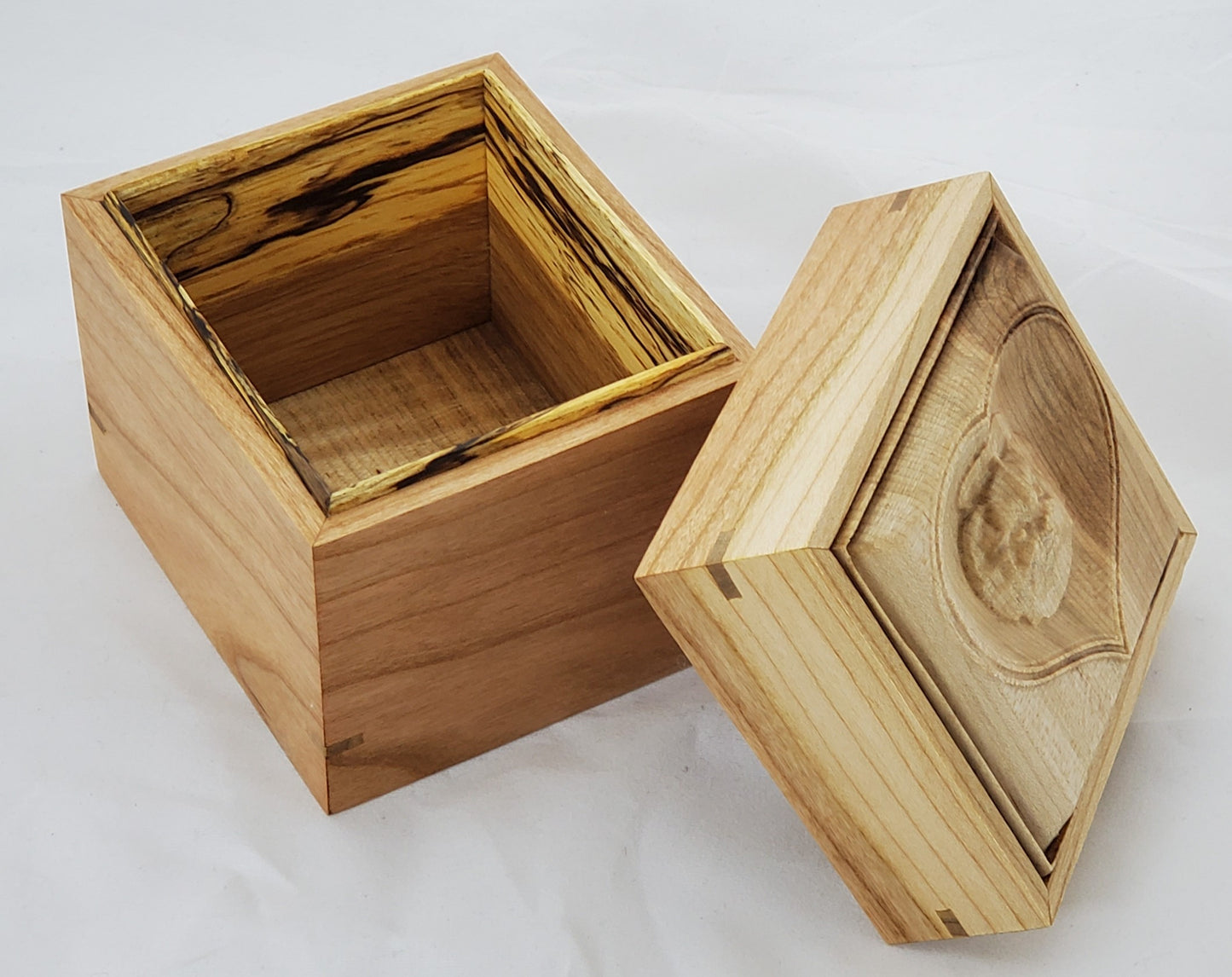 Cherry keepsake box or urn with a carved Shih-Tzu top cover