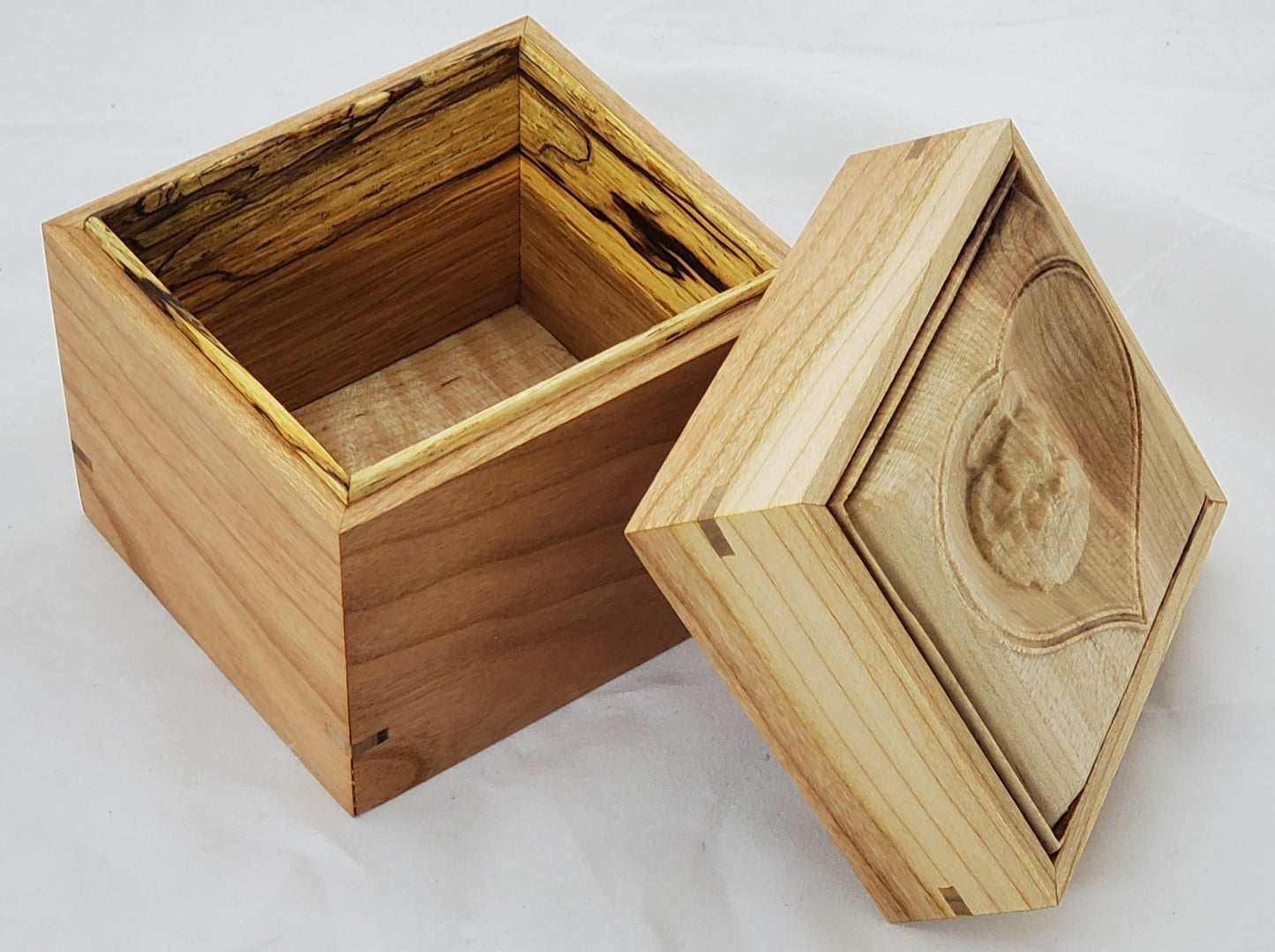 Cherry keepsake box or urn with a carved Shih-Tzu top cover