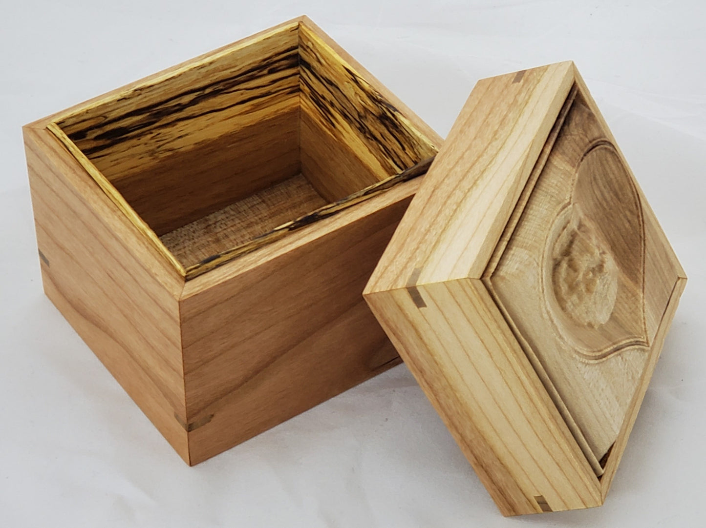 Cherry keepsake box or urn with a carved Shih-Tzu top cover