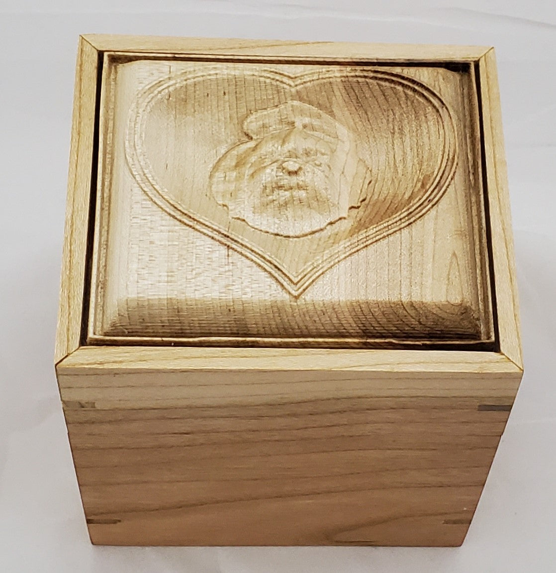 Cherry keepsake box or urn with a carved Shih-Tzu top cover